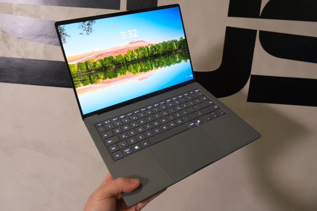 Asus Zenbook A14 in hand