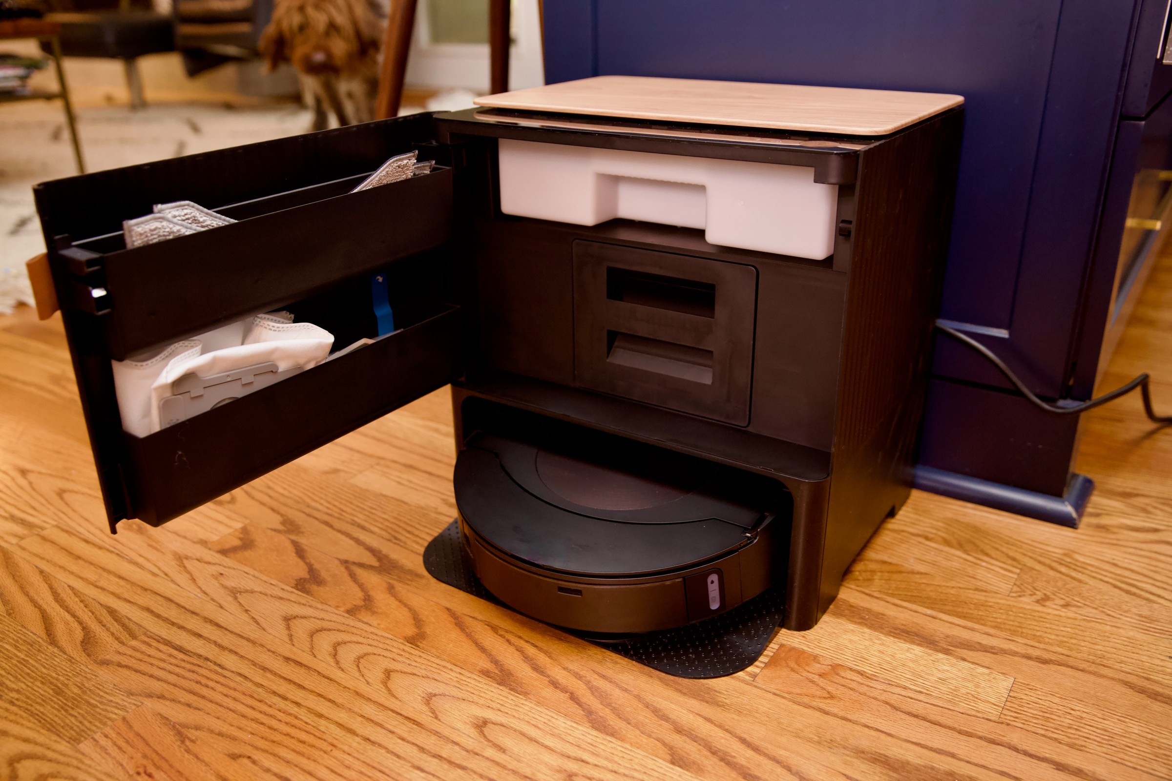 The Roomba j9 Combo Plus comes with a lovely auto-empty charging dock that can refill the robot’s water tank and doubles as a storage case for mop pads and dustbins. Plus, it serves as a nice little coffee table.