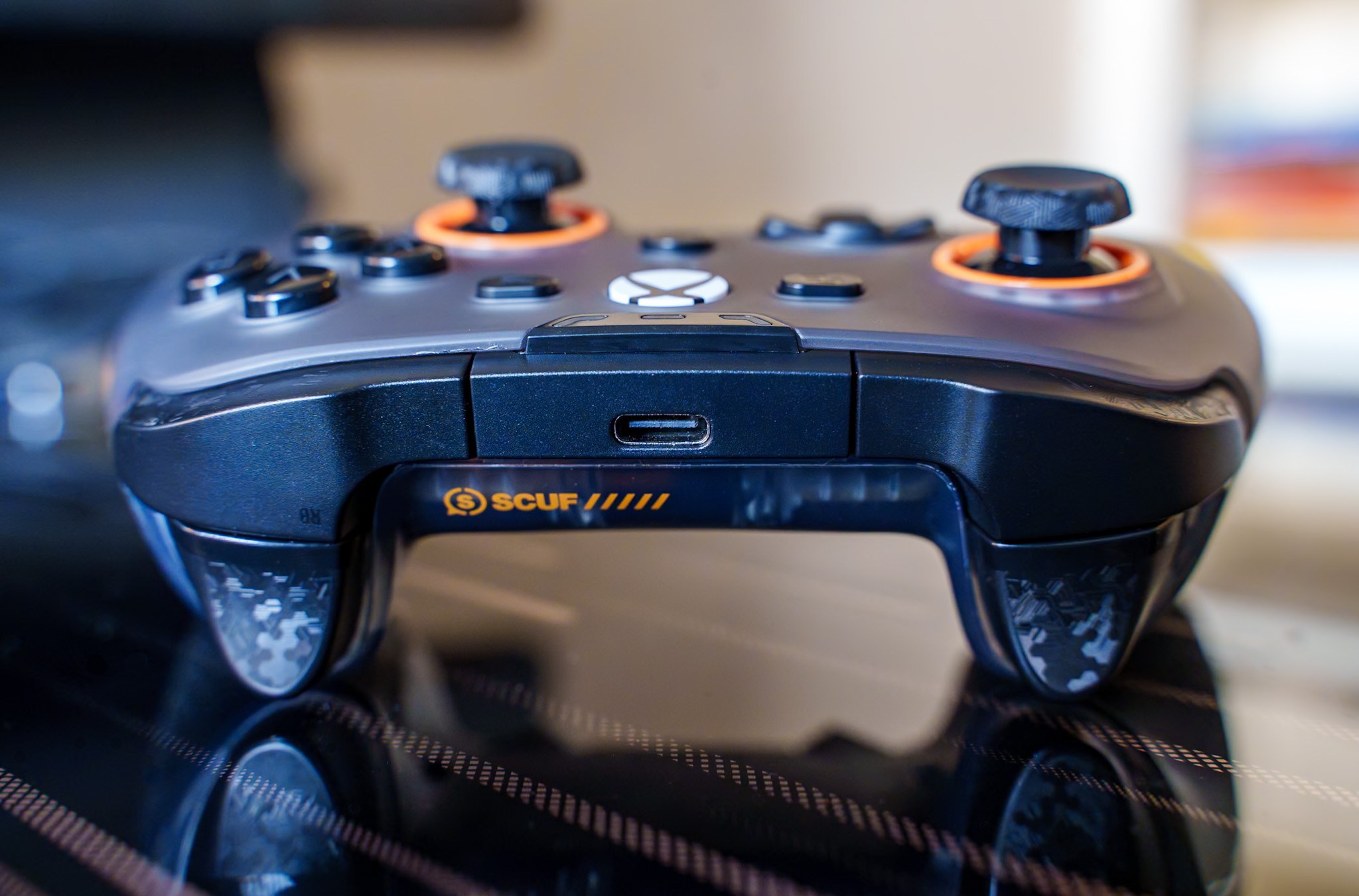 Photo of scuf valor pro xbox controller on glassy desk