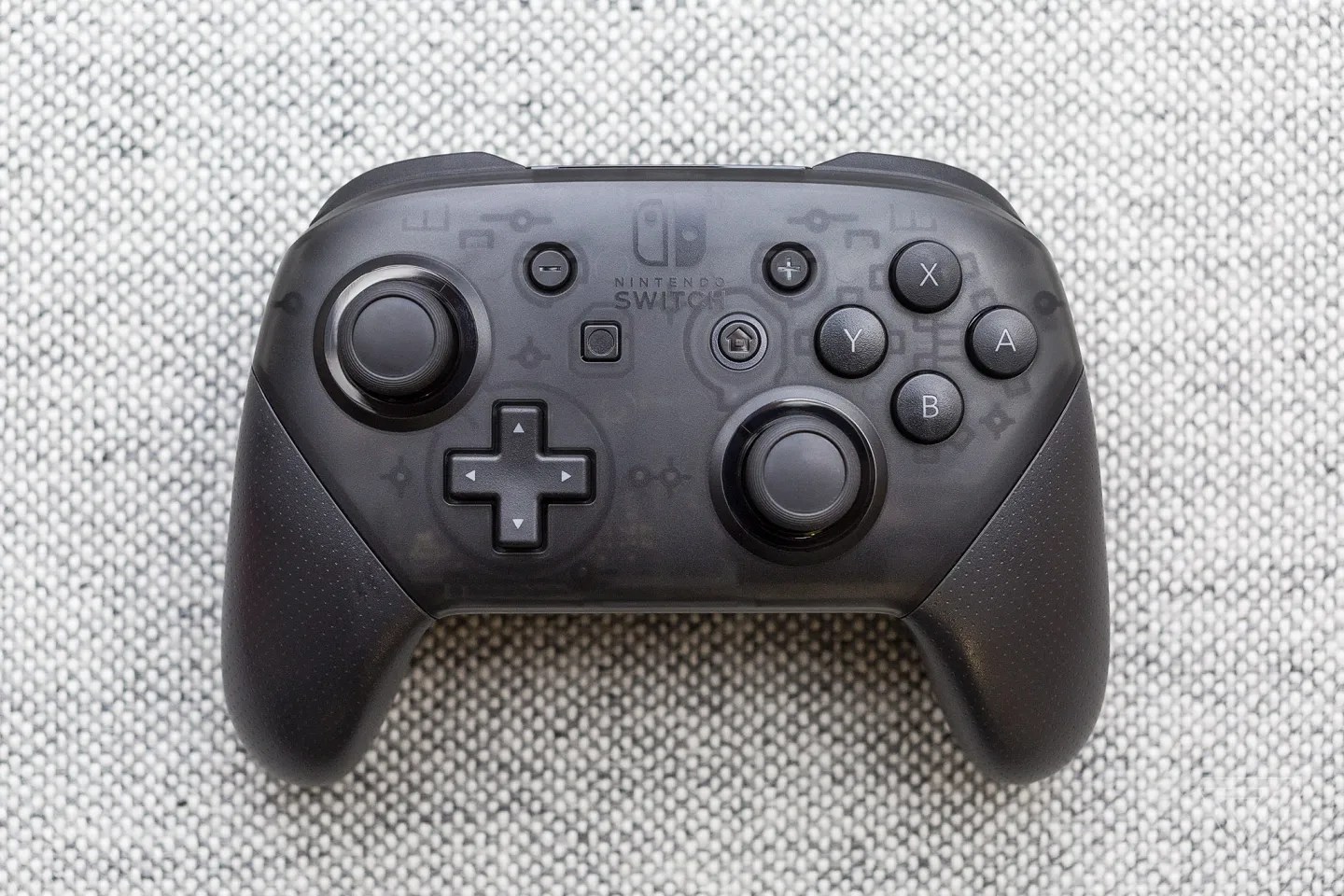 A photo of a Nintendo Switch Pro controller.