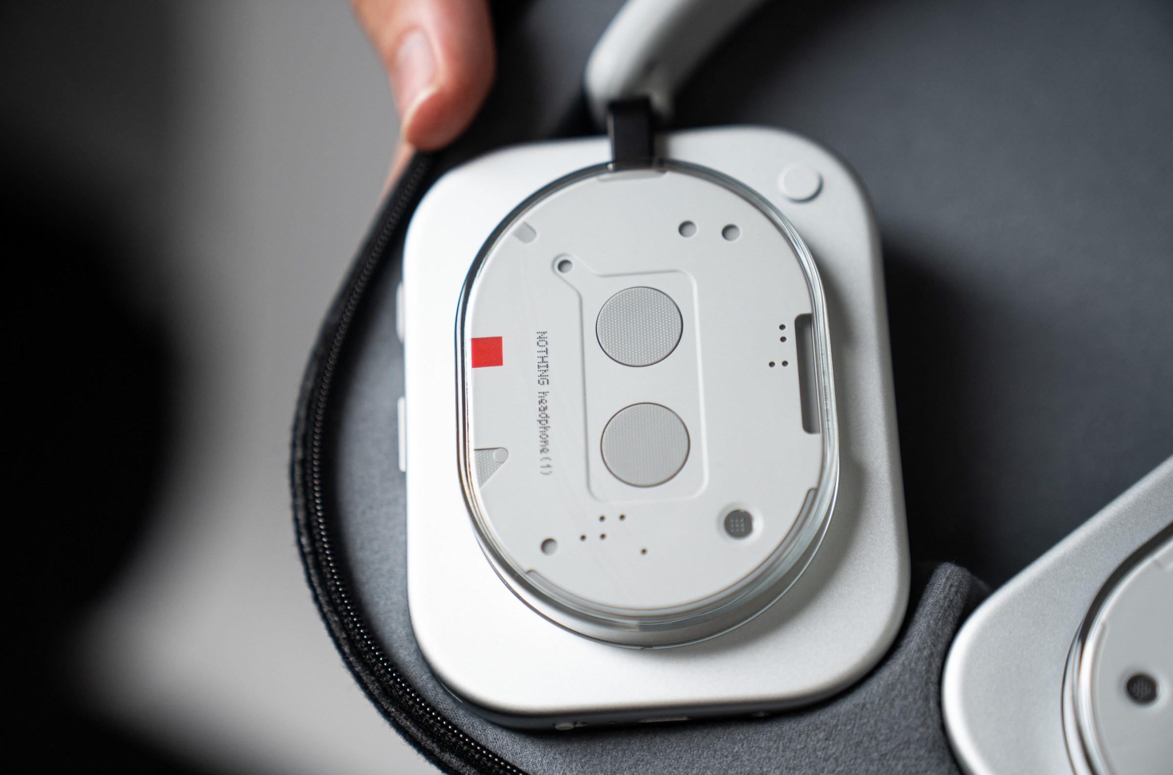 A view of the outside of the right ear of the Nothing Headphones.