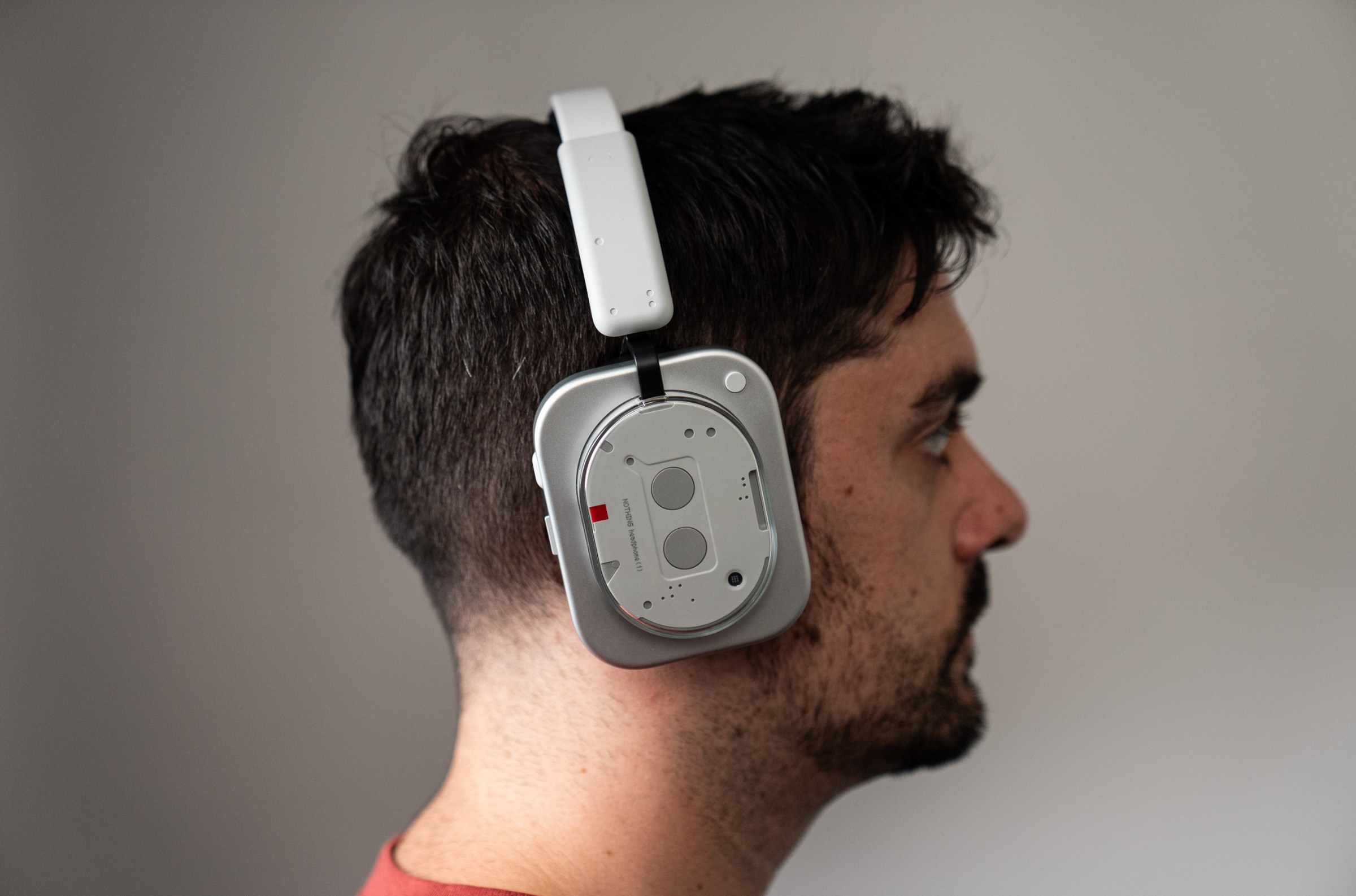 side profile of the person wearing Nothing headphones
