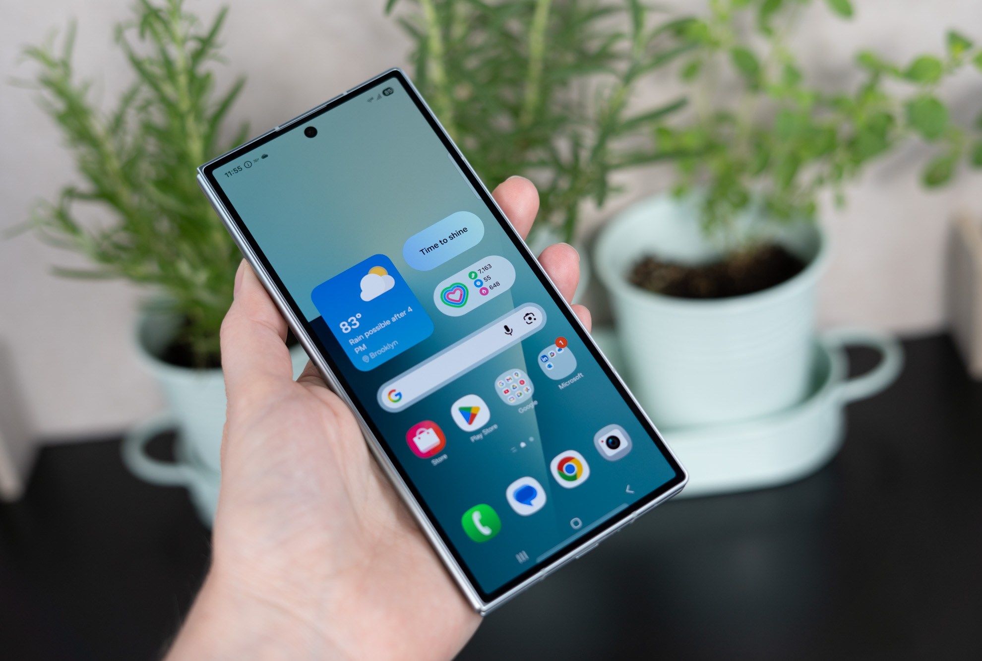 Samsung Galaxy Z Fold 7 in hand showing cover screen.