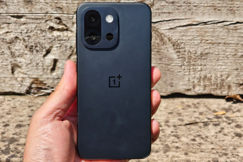 OnePlus 13s review in hand rear