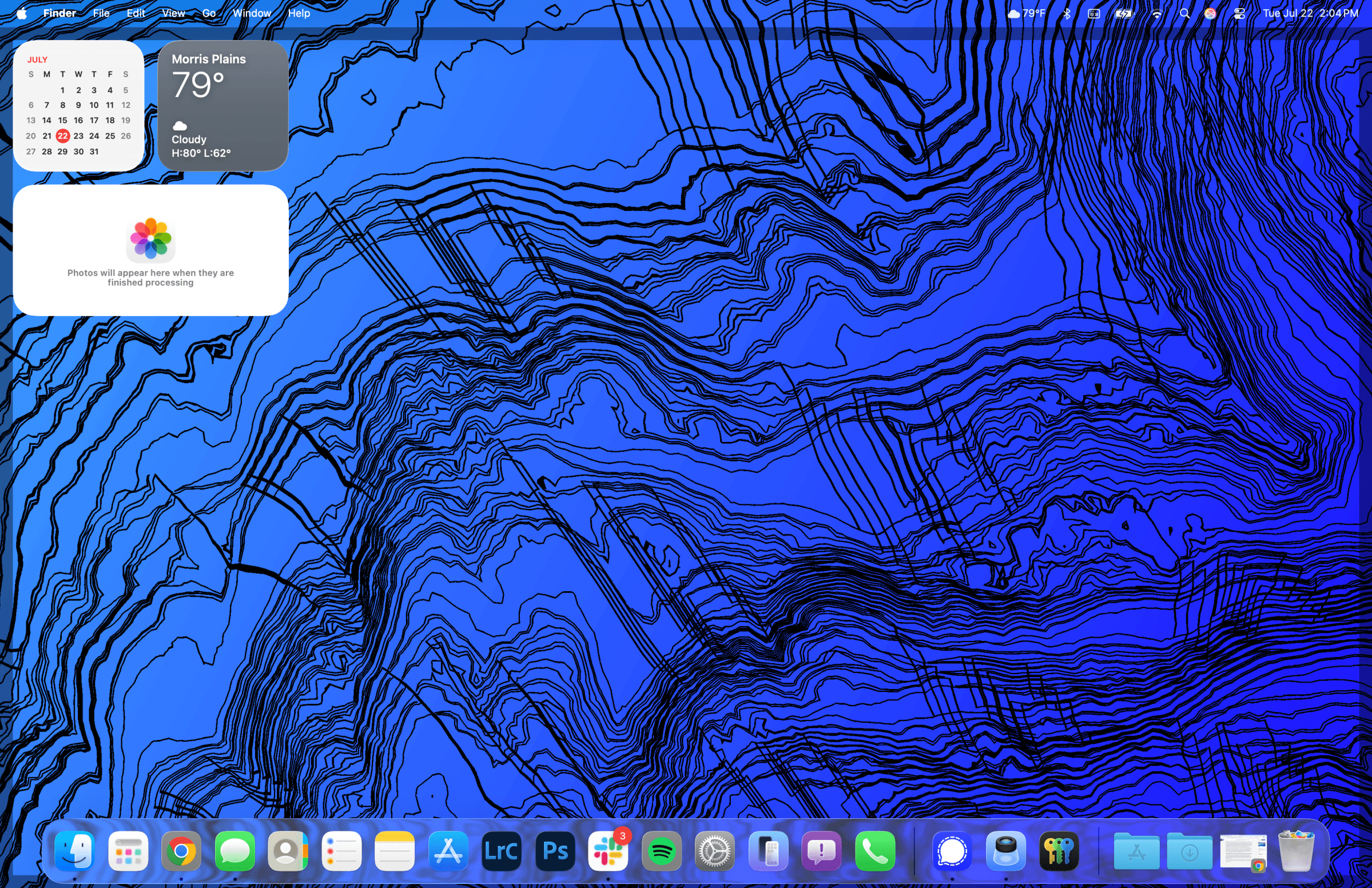 <em>The invisible Menu Bar in Tahoe, with the Show Desktop outline beneath it — which looks strange to my eyes.</em>