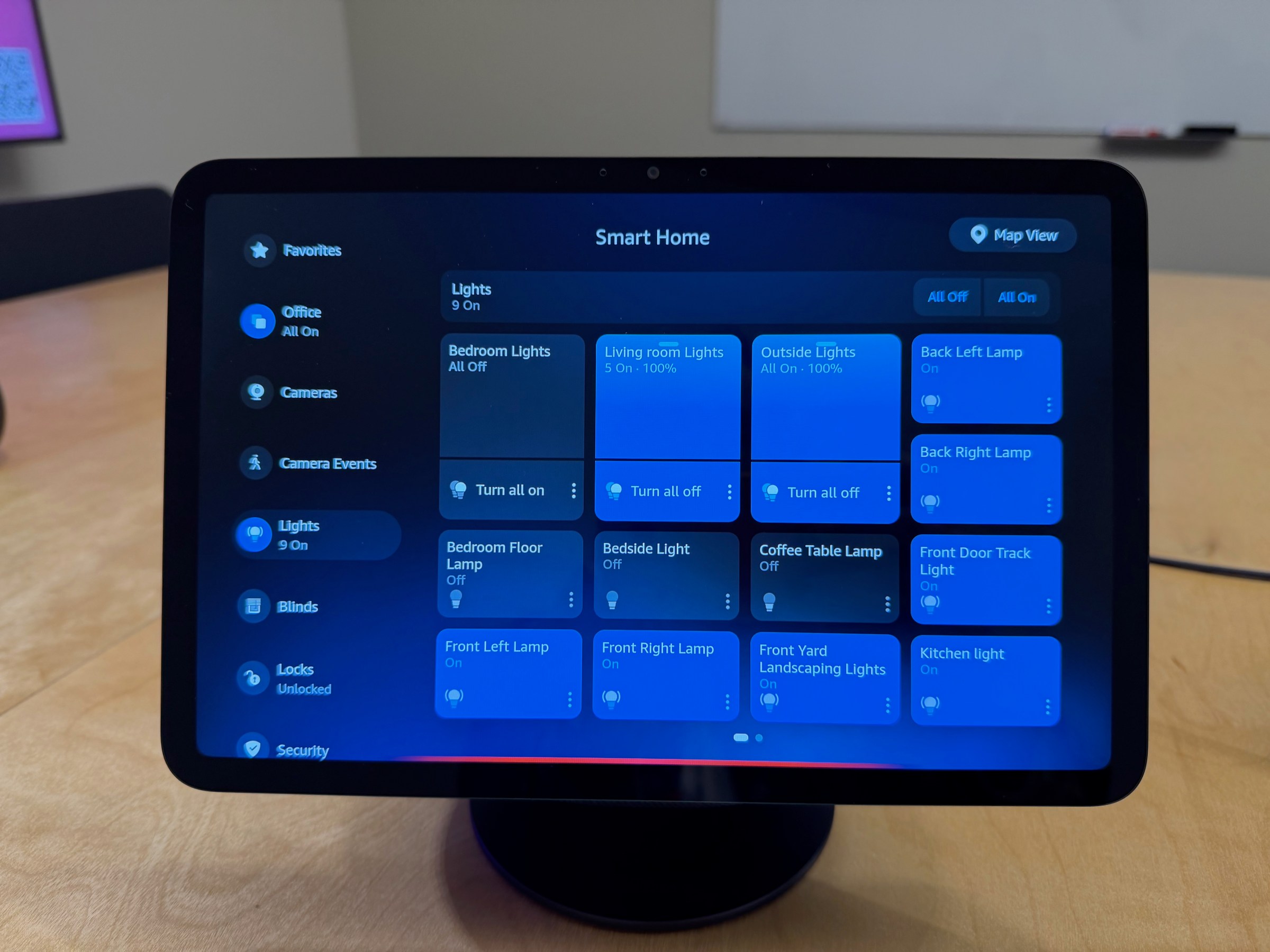 <em>You can tap into each room to control devices.</em>