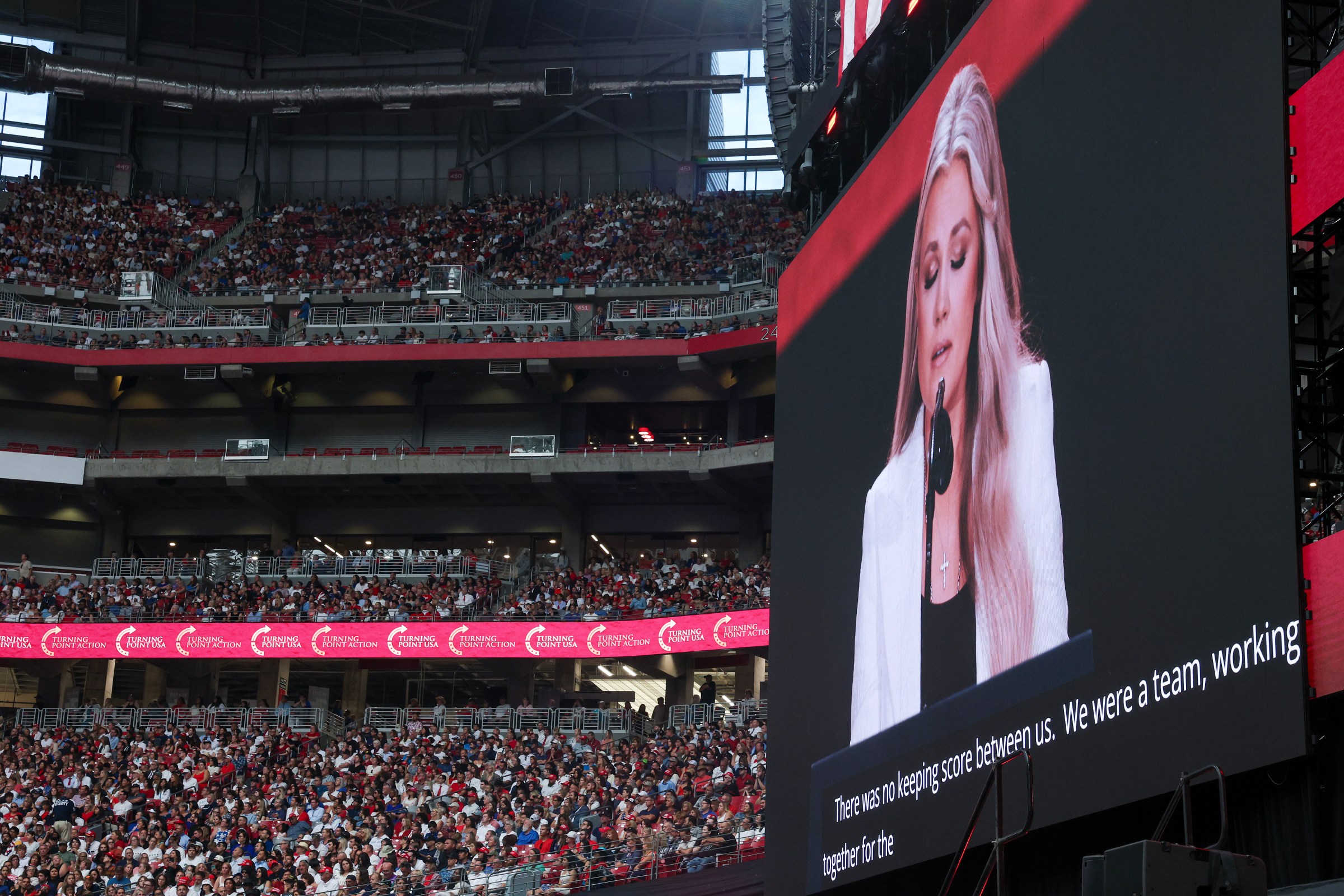Erika Kirk speaks during the memorial service for her husband, political activist Charlie Kirk at State Farm Stadium on September 21, 2025 in Glendale, Arizona.