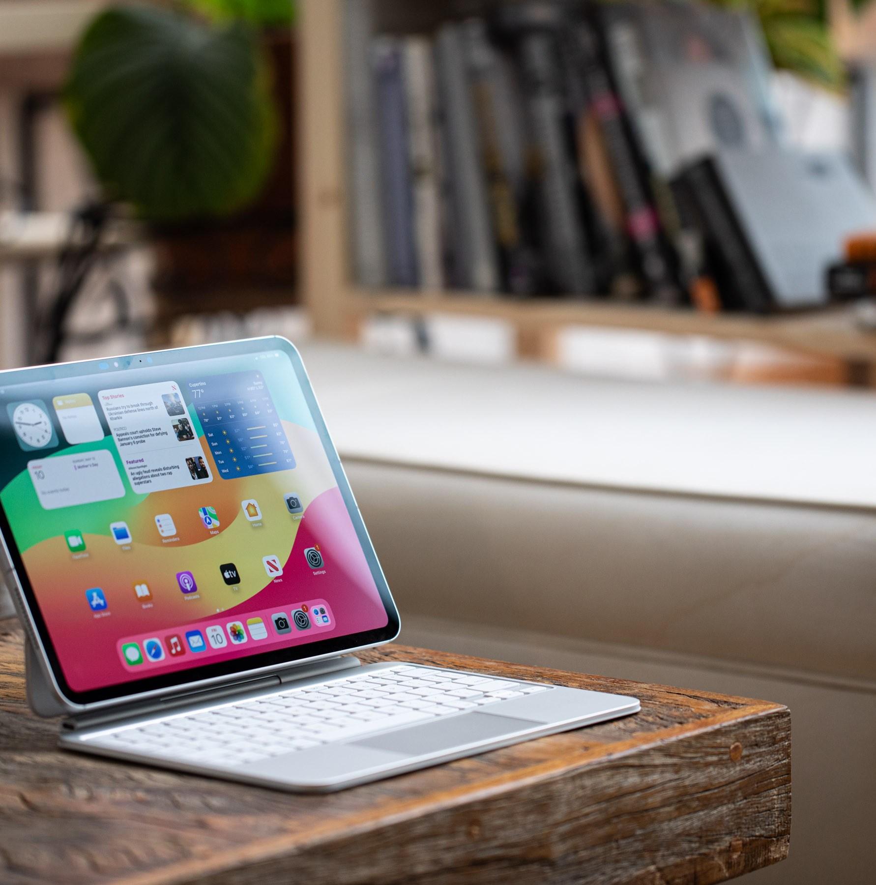 A photo of the iPad Pro on a wooden table.