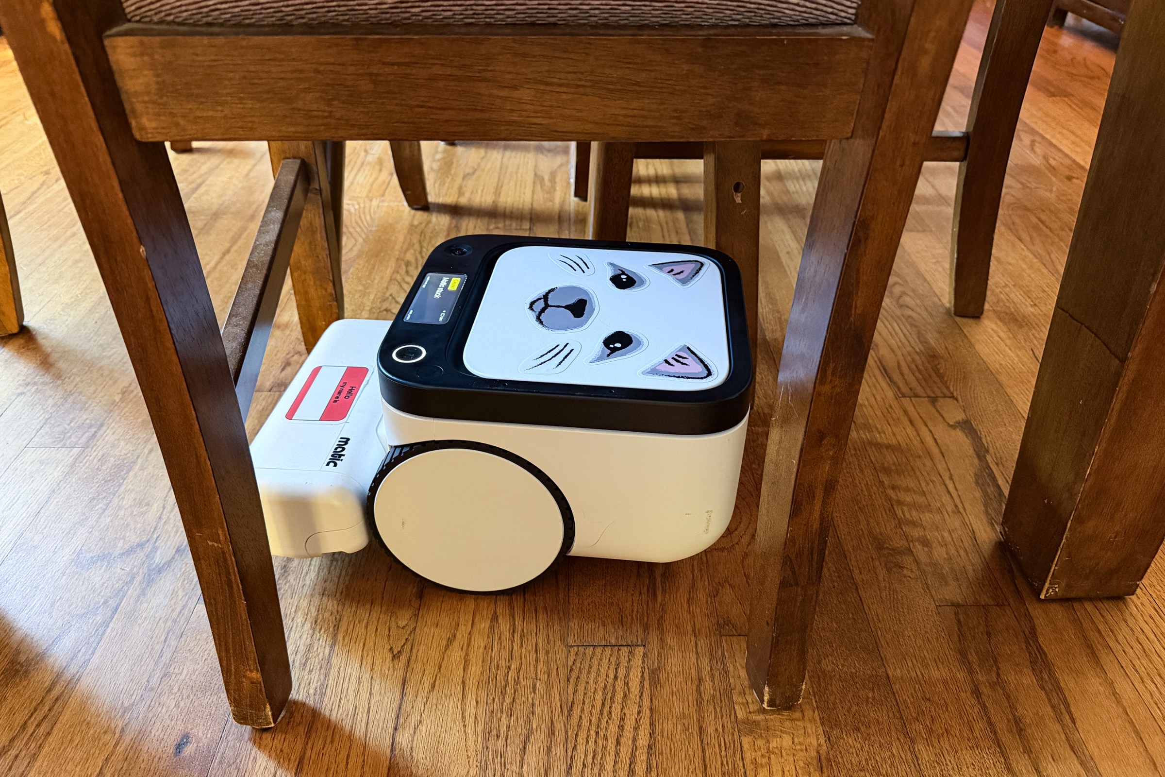 In my 6 months of testing Matic it only got stuck twice. Once, it tried to suck up my son’s sweater from a rug (they were the same color), and this moment when it got trapped by several chair legs under the dining room table.