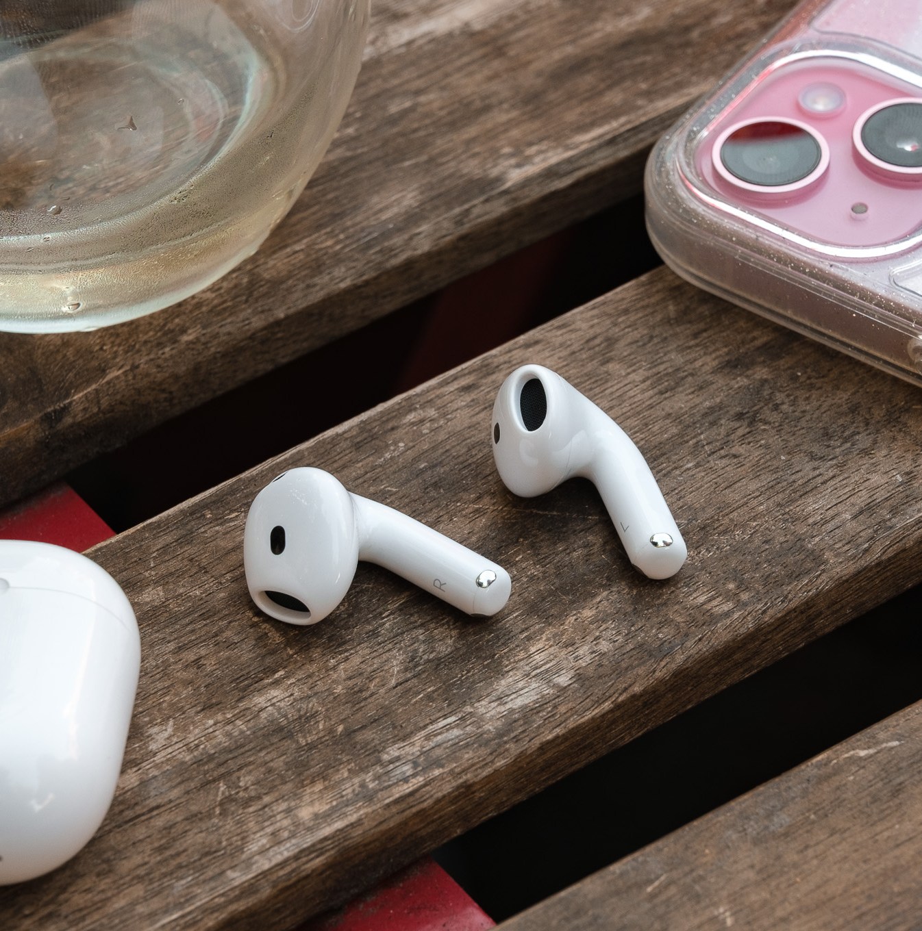 A hands-on photo of Apple’s AirPods 4 wireless earbuds.