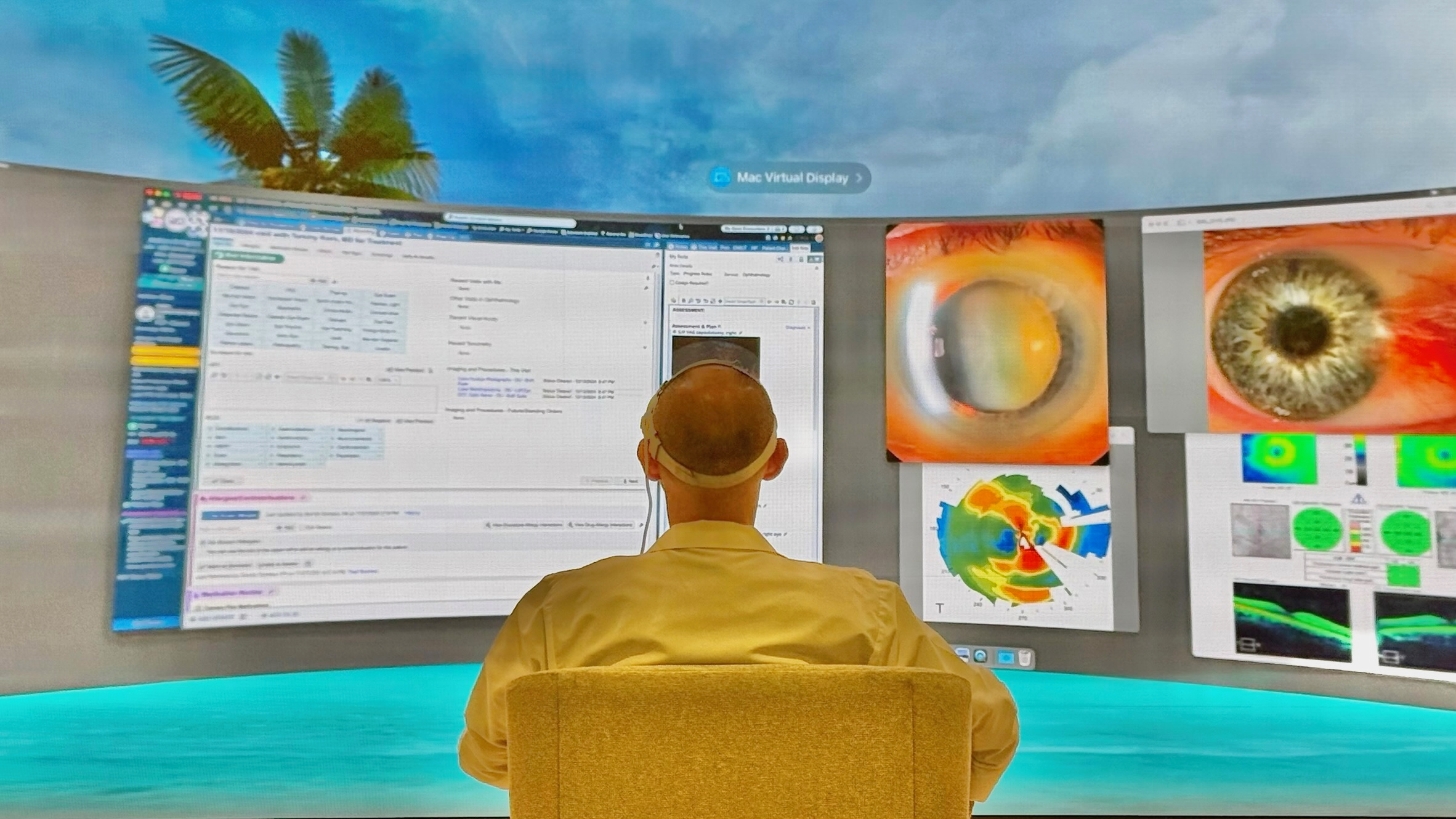 Doctor looking at various displays inside a Vision Pro