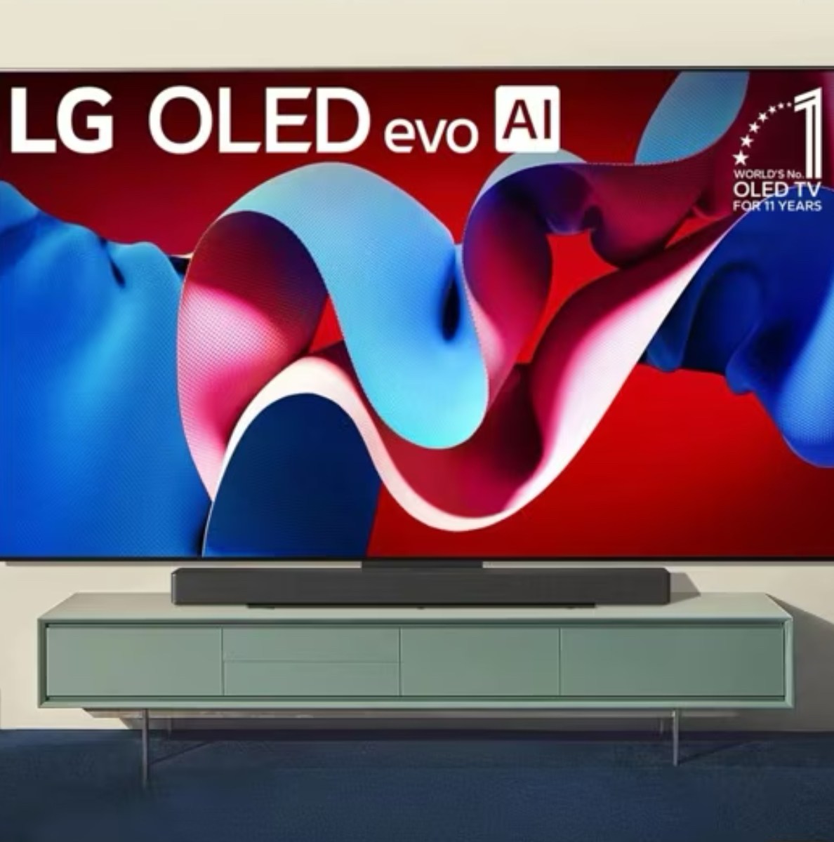 LG’s C4 4K OLED TV sitting on top of a media center along with a sound bar.
