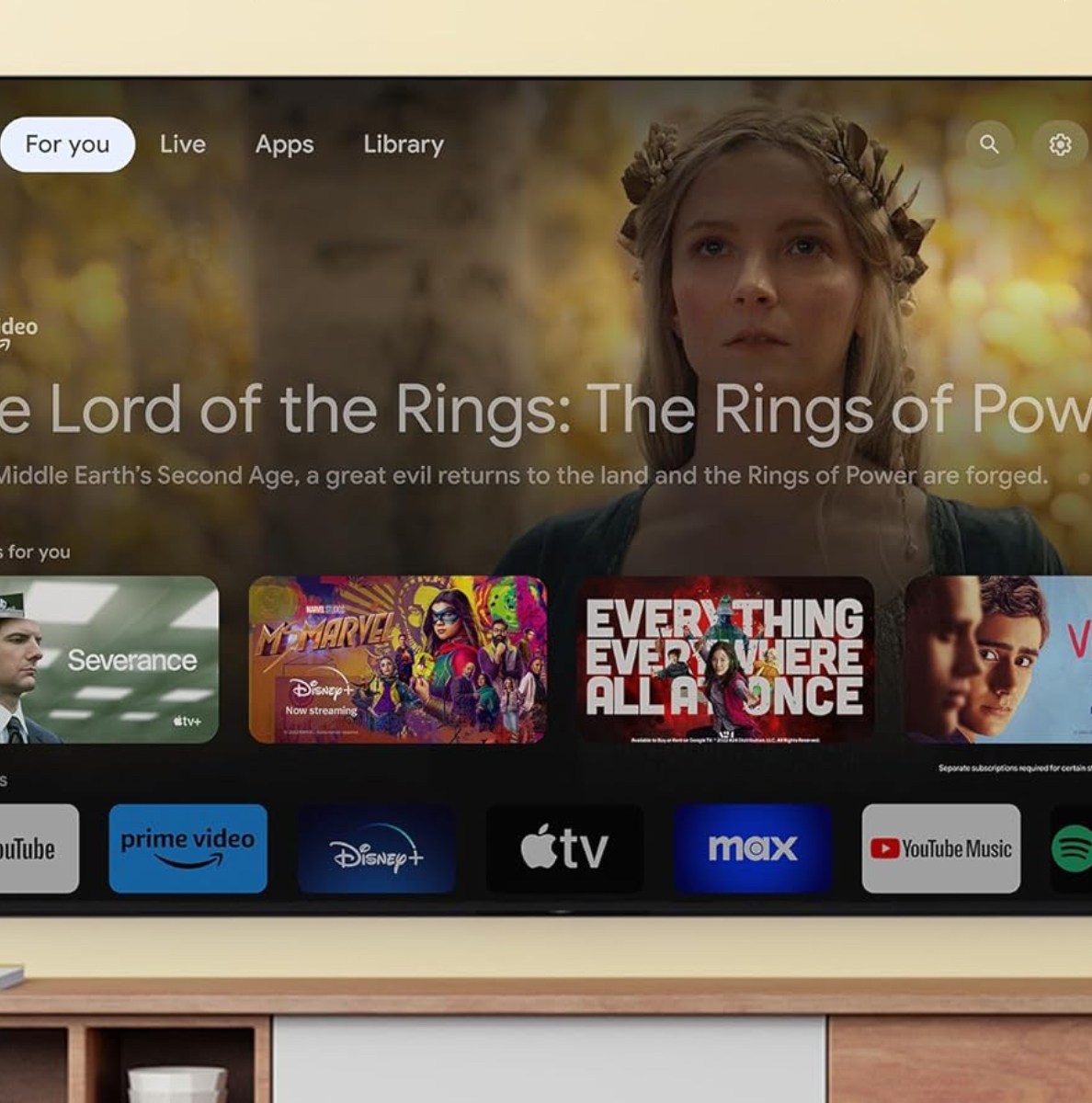 An image of Sony's XR A95L on top of a media center.