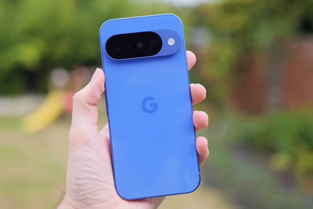 Google Pixel 10 in hand, rear case