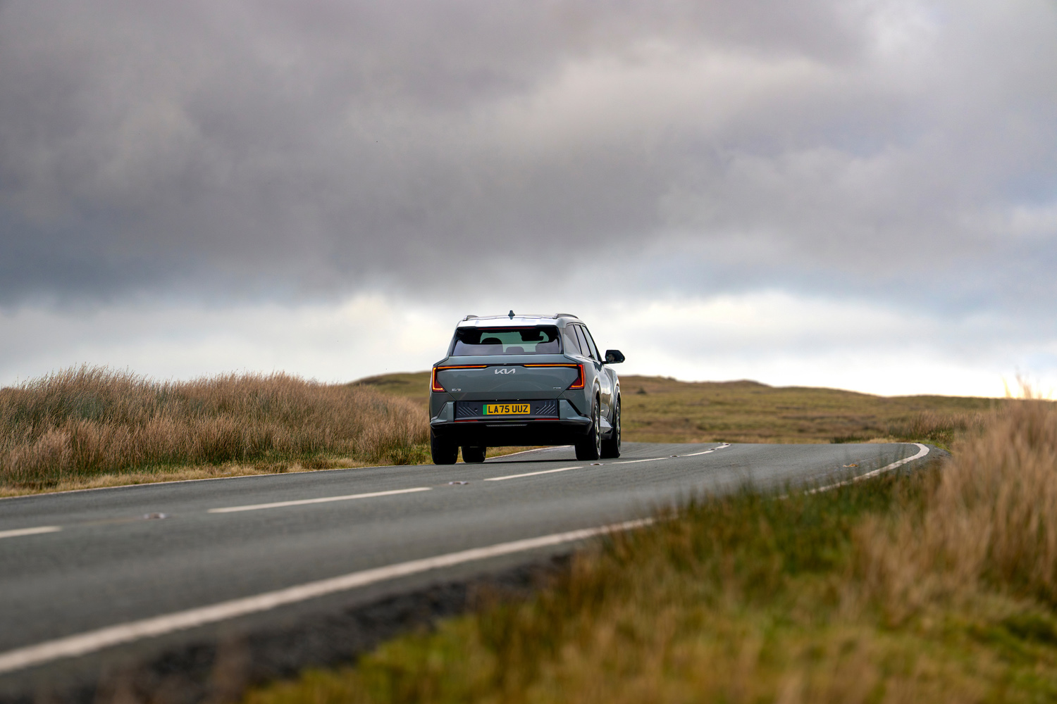 Kia EV5 drive on road rear
