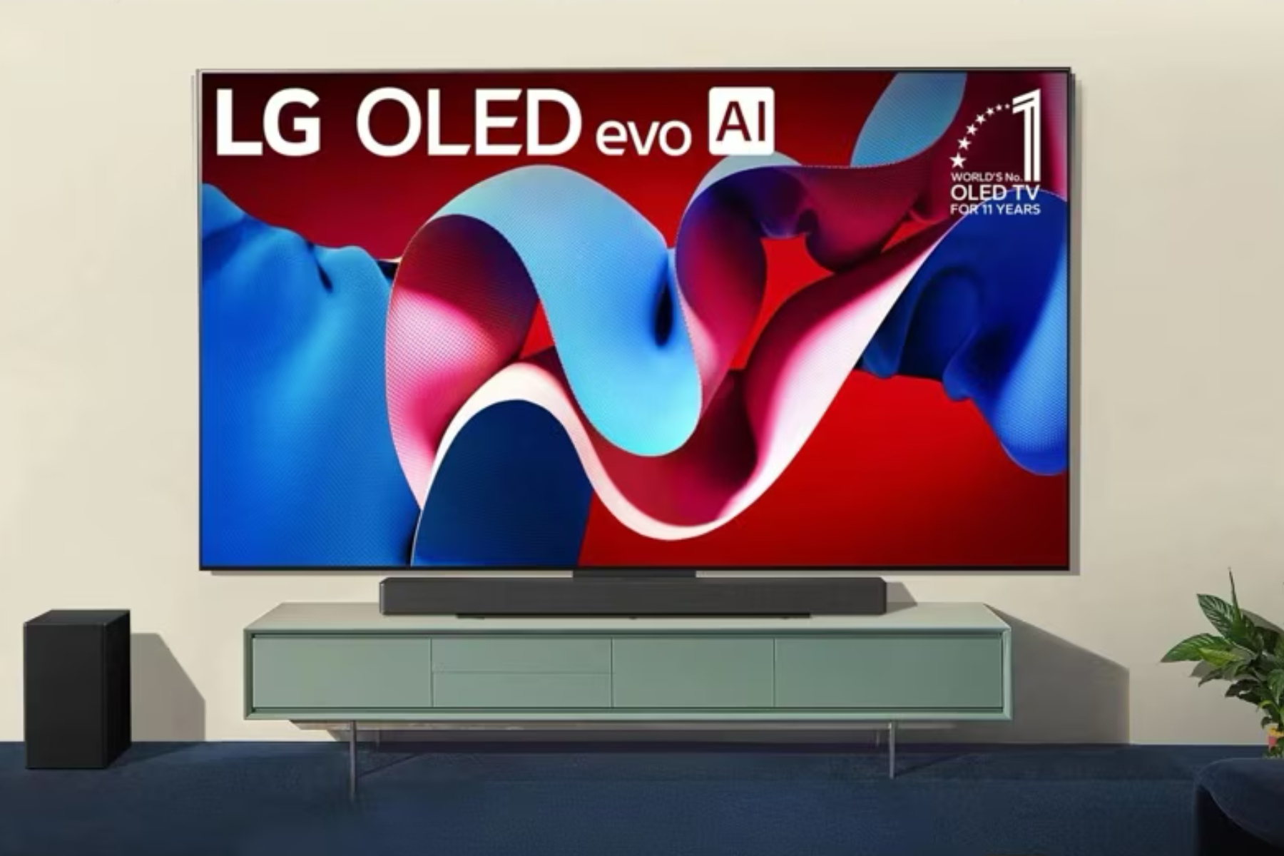 LG’s C4 4K OLED TV sitting on top of a media center along with a sound bar.