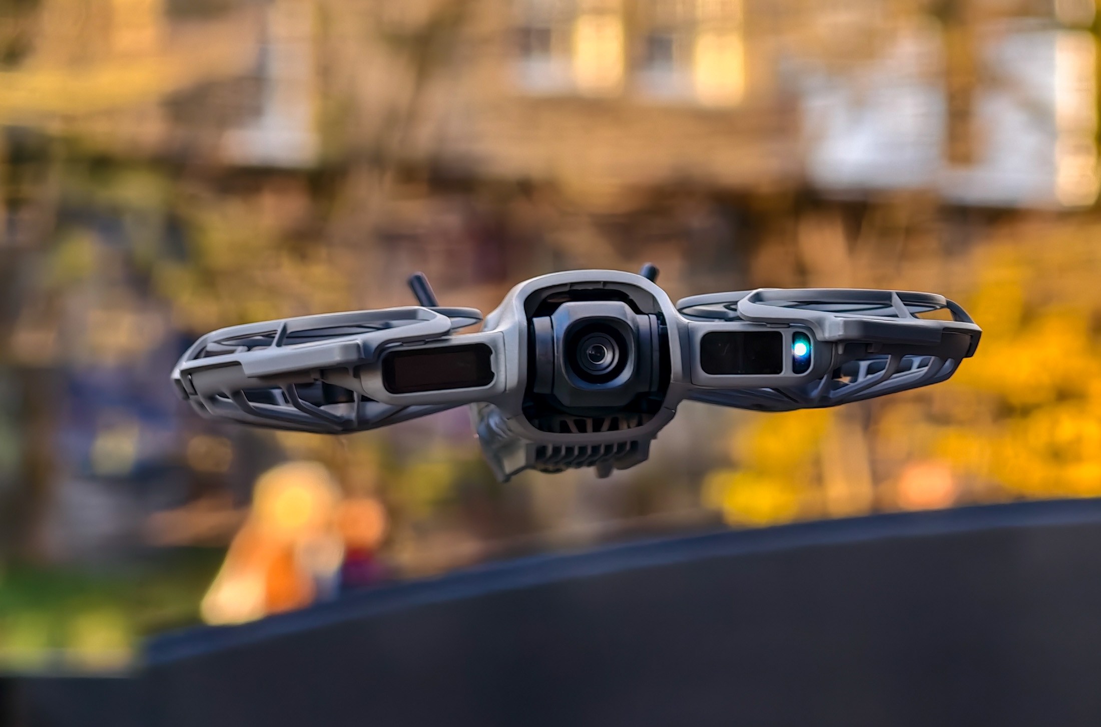 Photo of DJI Neo 2 flying in front of a canal