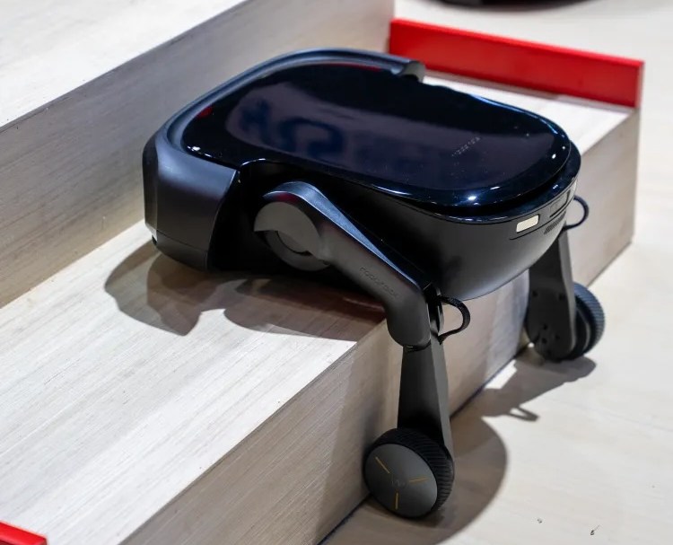 A robot vacuum with little legs