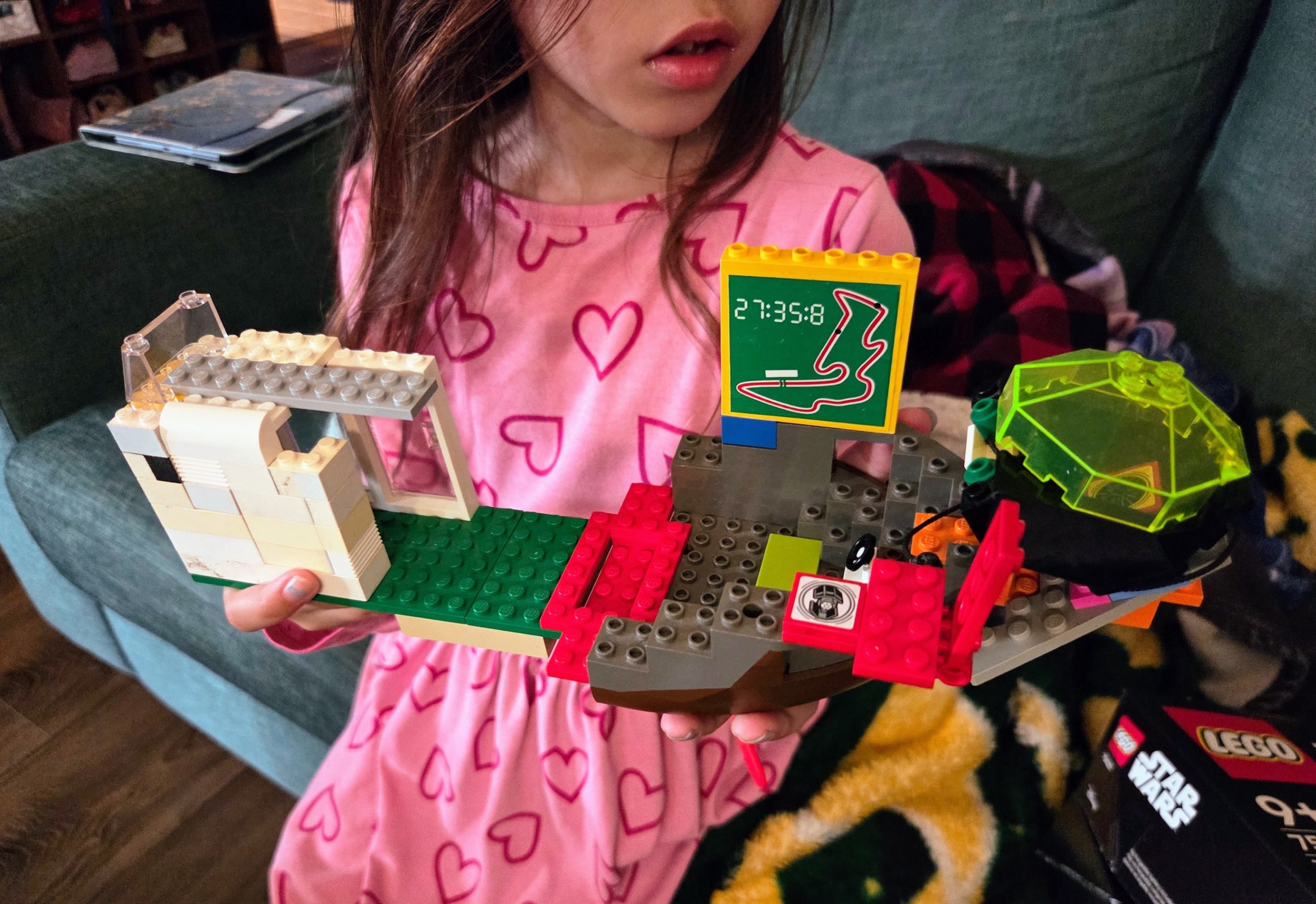 My eldest made her own “houseboat” using Smart Tags and some pieces from our Lego bin.