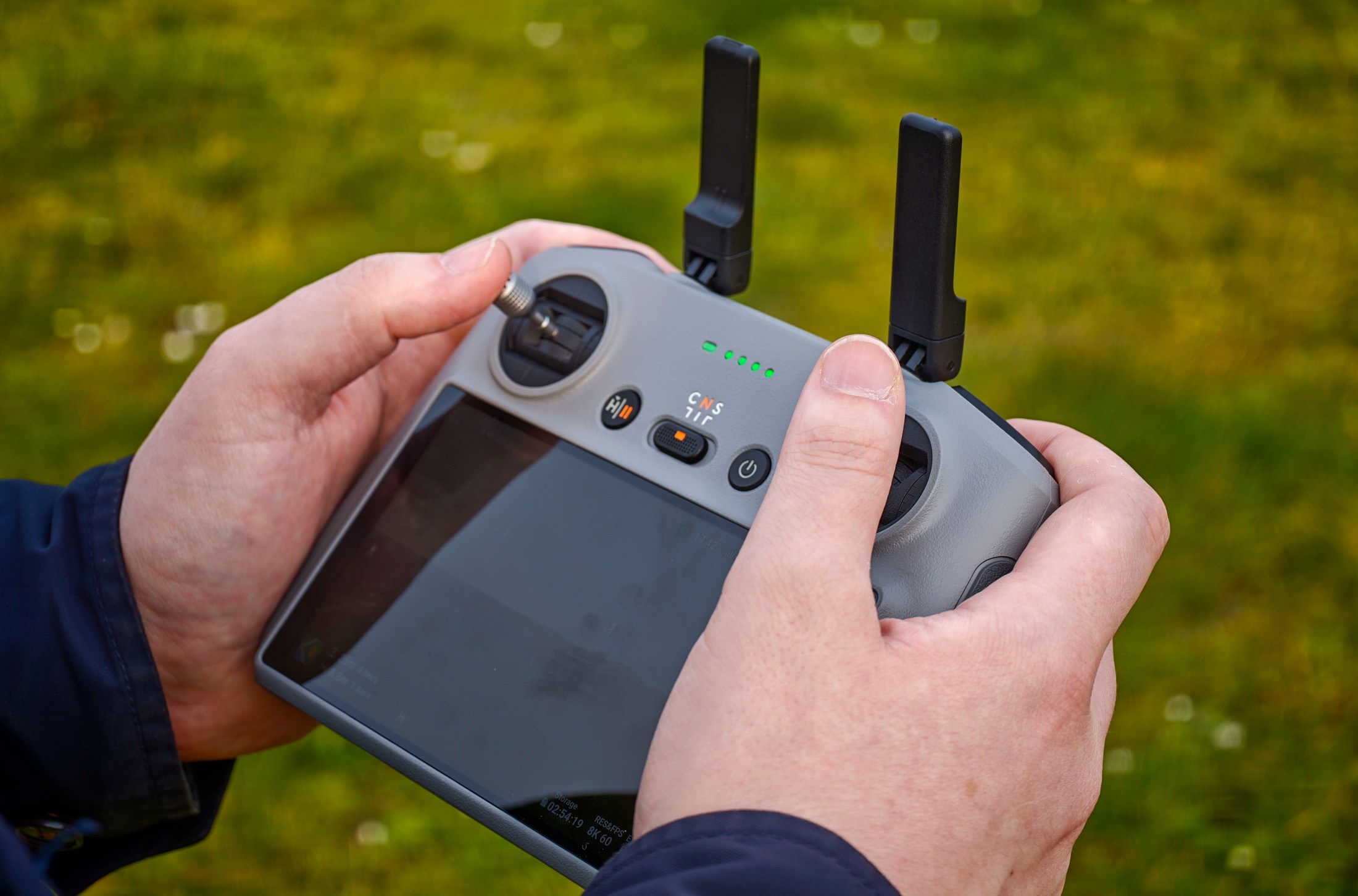 Photo of the DJI RC 2 controller in someone’s hands