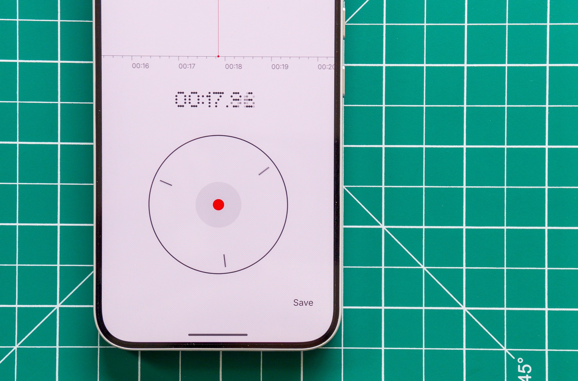 Photo of Nothing Phone 4A Pro on a green cutting mat showing the recorder app