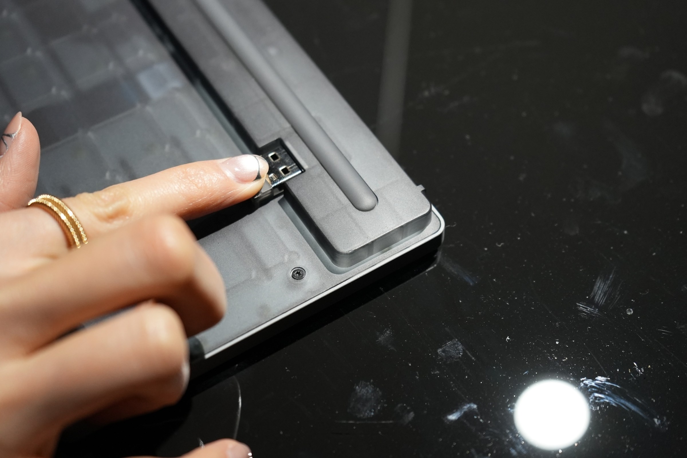 The USB-A dongle slides in here, and it feels secure.