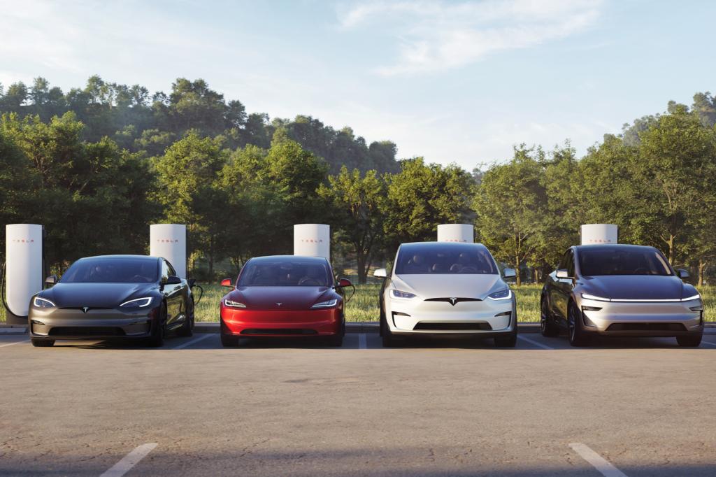 Four Tesla cars at a super charger