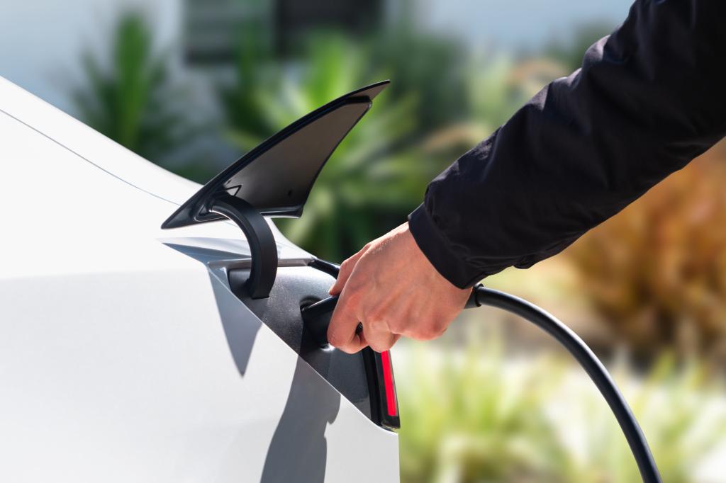 Plugging charger in car