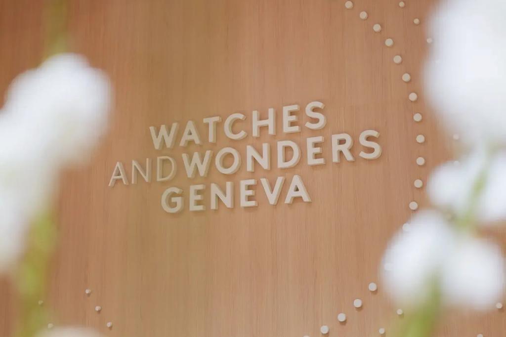 Watches and wonders logo on a wall