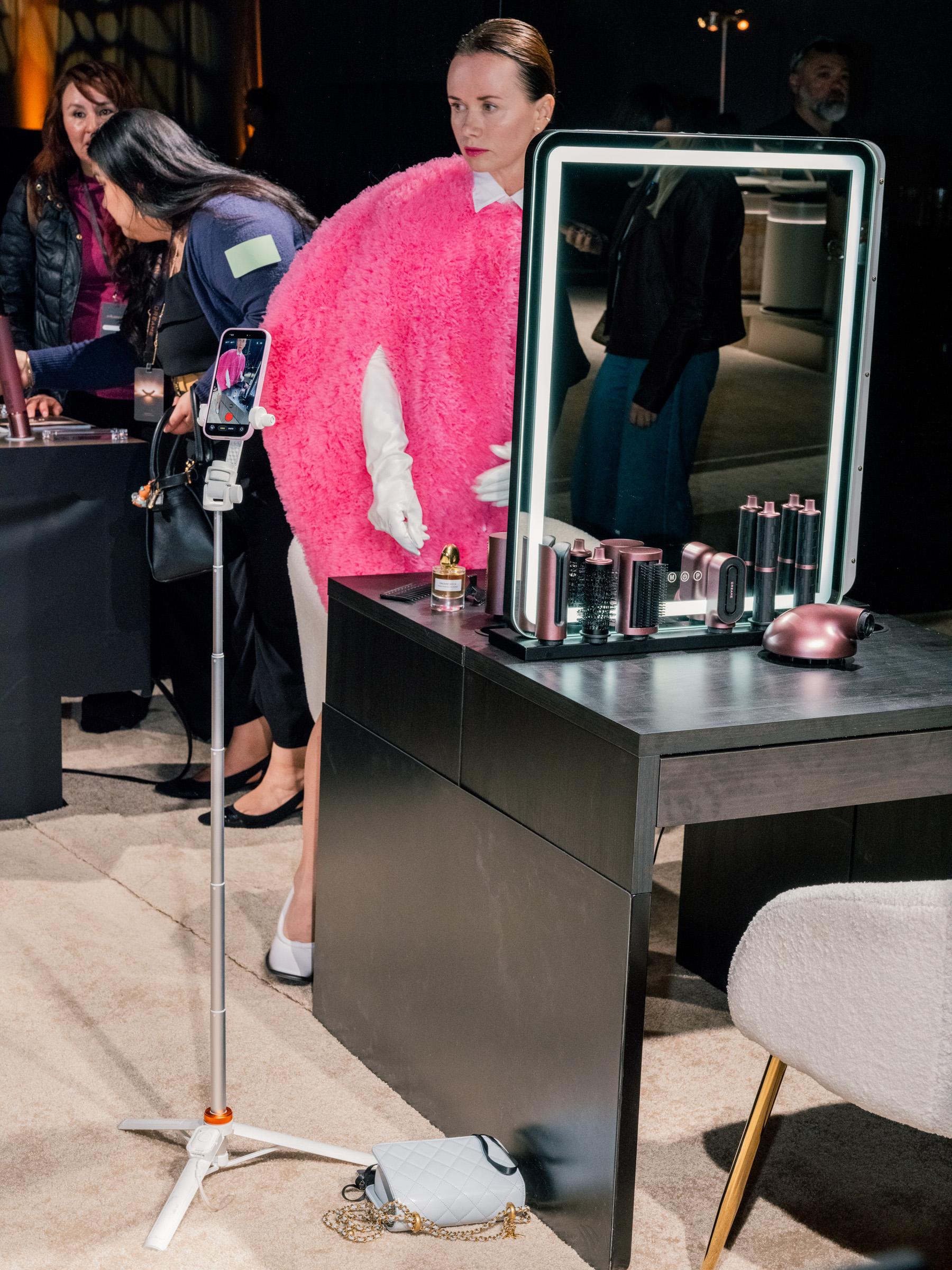 An Influencer samples beauty products the Dreame NEXT event during the Silicon Valley Summit at the Palace of Fine Arts on April 29, 2026 in San Francisco, CA.