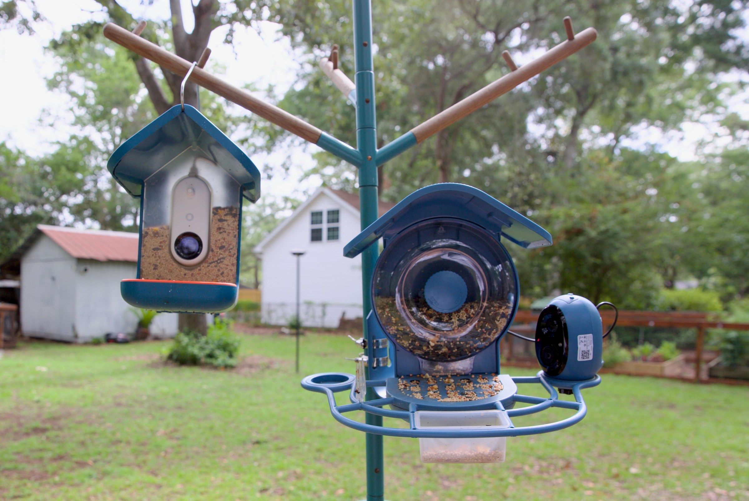 The Birdbuddy Pro and the Coolfly Aura (right) on the Bird Buddy Nature Station.