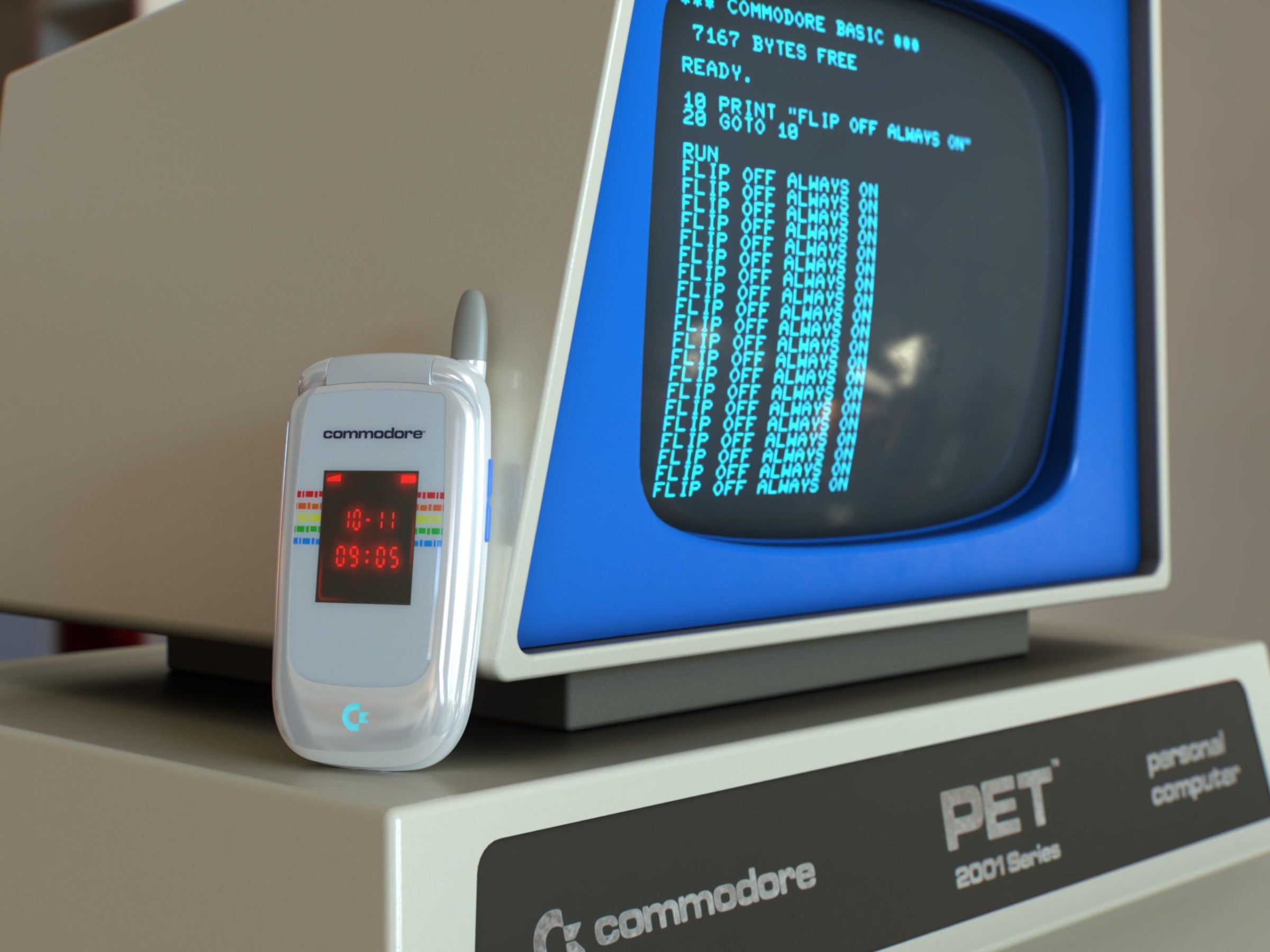 A photo of a flip phone resting on a beige retro computer.