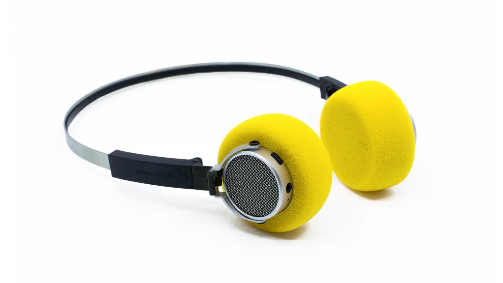 A pair of We Are Rewind EQ-002 Freddie headphones with yellow ear cushions