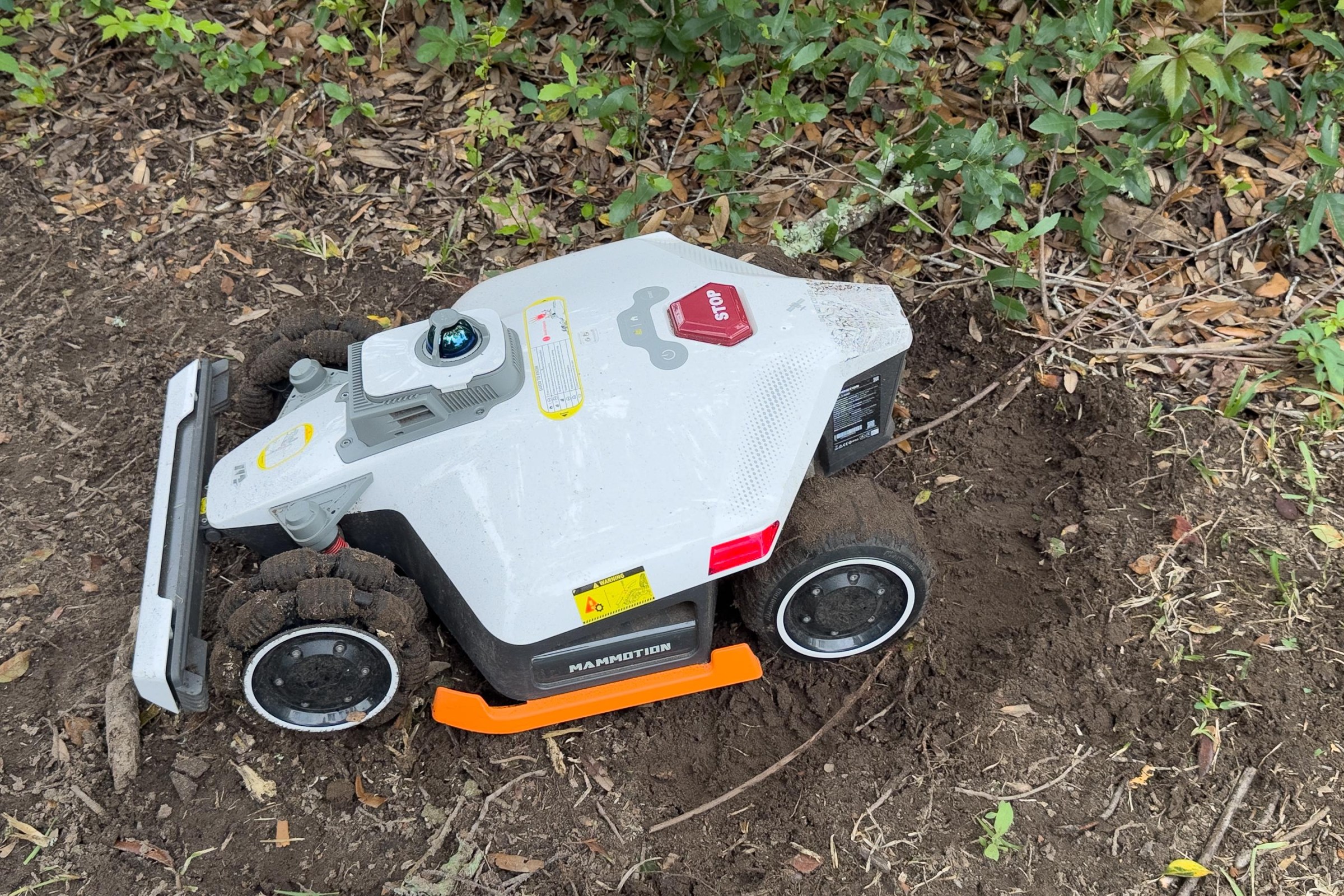 While the Mammotion did great cutting the lawn, it had serious issues with turns and soft ground. It dug itself sandpits and tore up grass in a particularly soft spot.