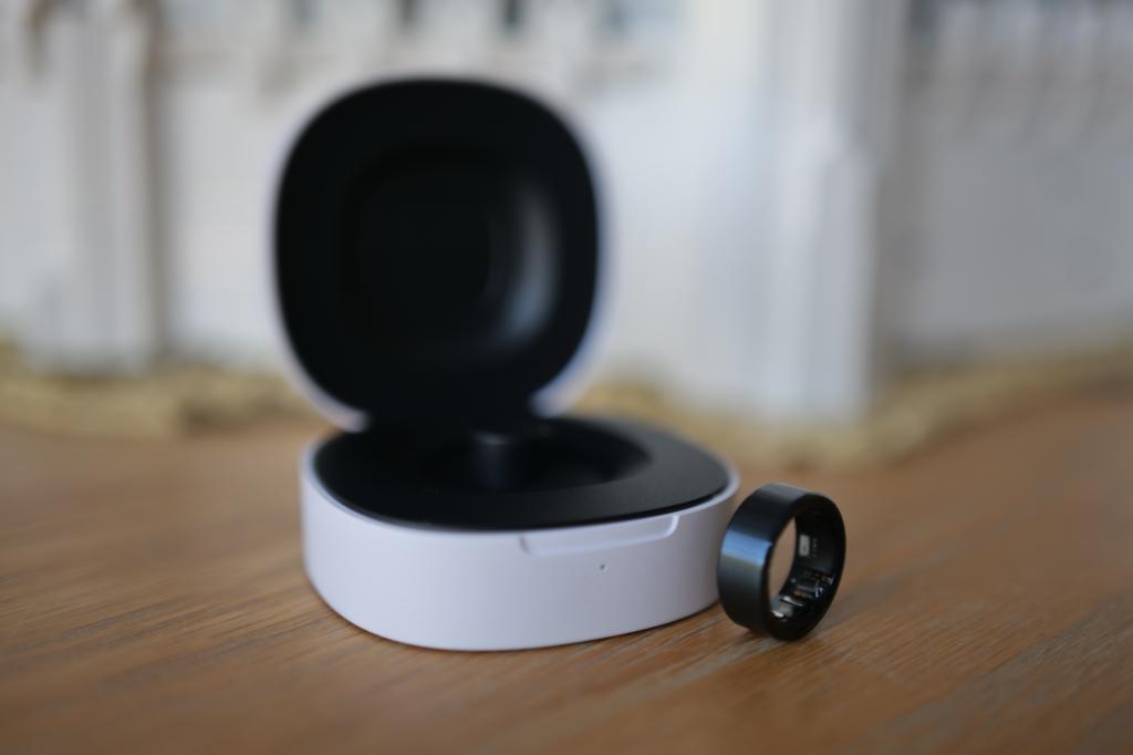 Leep Ring 1 and charging case on table