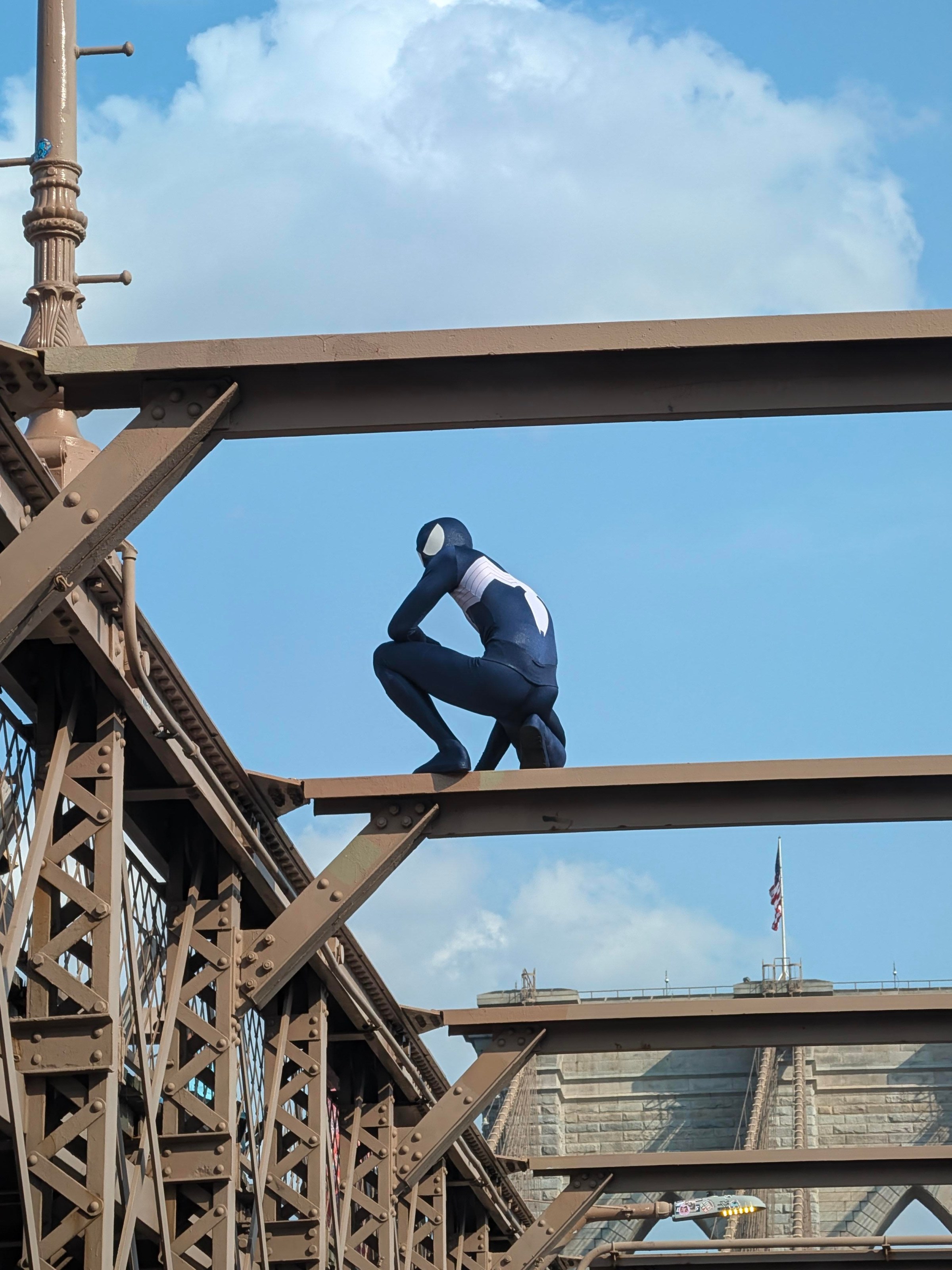 The Pixel 11 is fast enough to snag not just a good photo of a Spider-Man imposter on the Brooklyn Bridge while driving by in a car, but a great one.