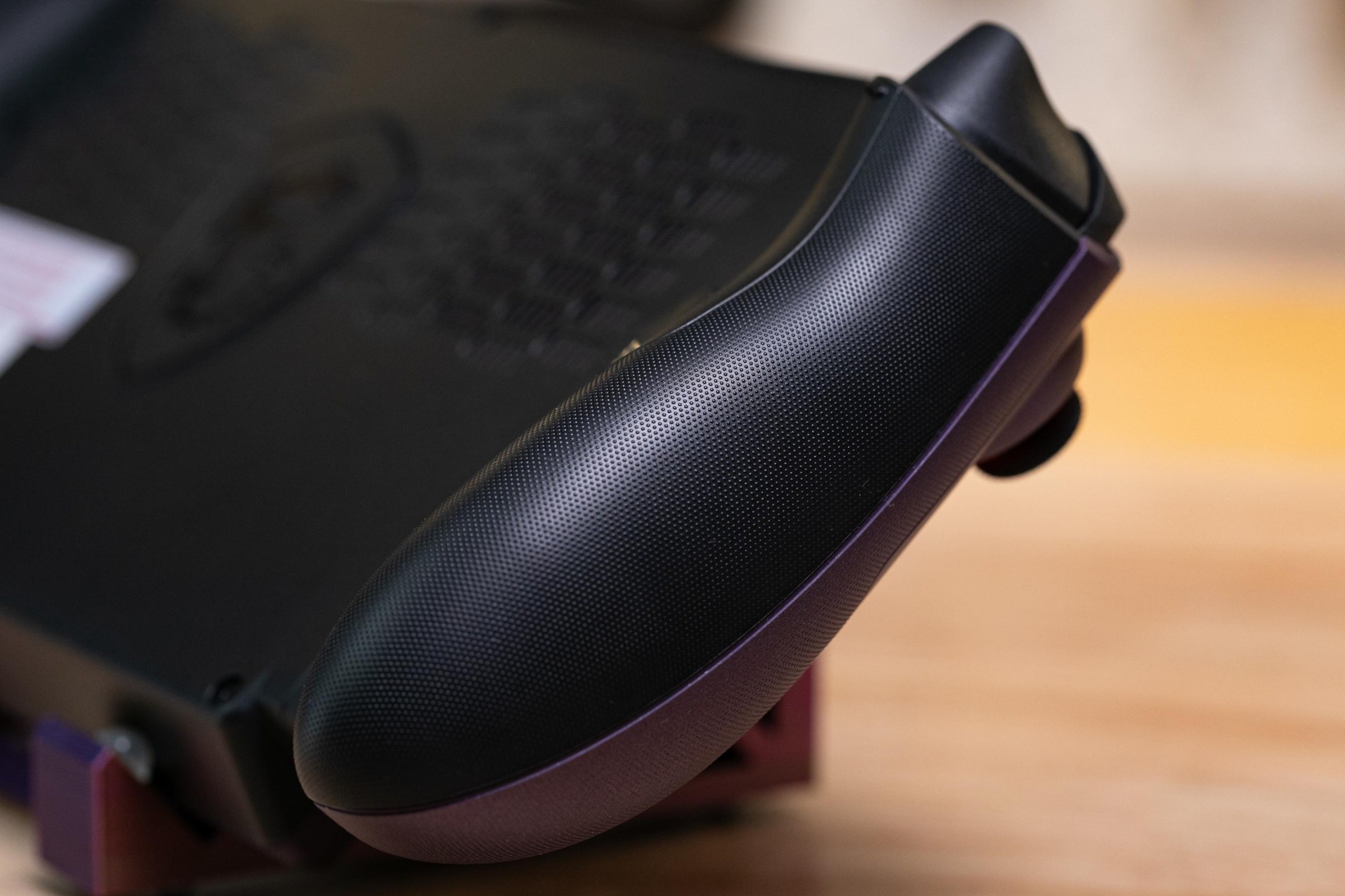 Here’s the underside of those meaty grips. I’d prefer grippier, but the stippling is not bad at all.